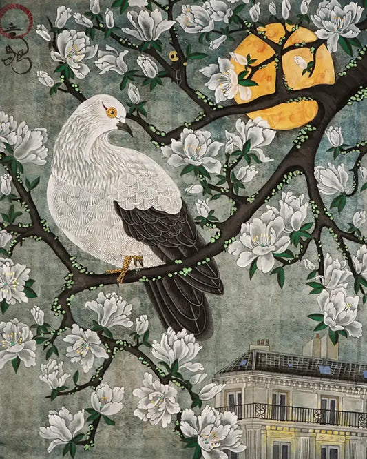 A white and black pigeon perched on branches of white blossoms against a moody grey sky with a large golden full moon and a Parisian balcony below.