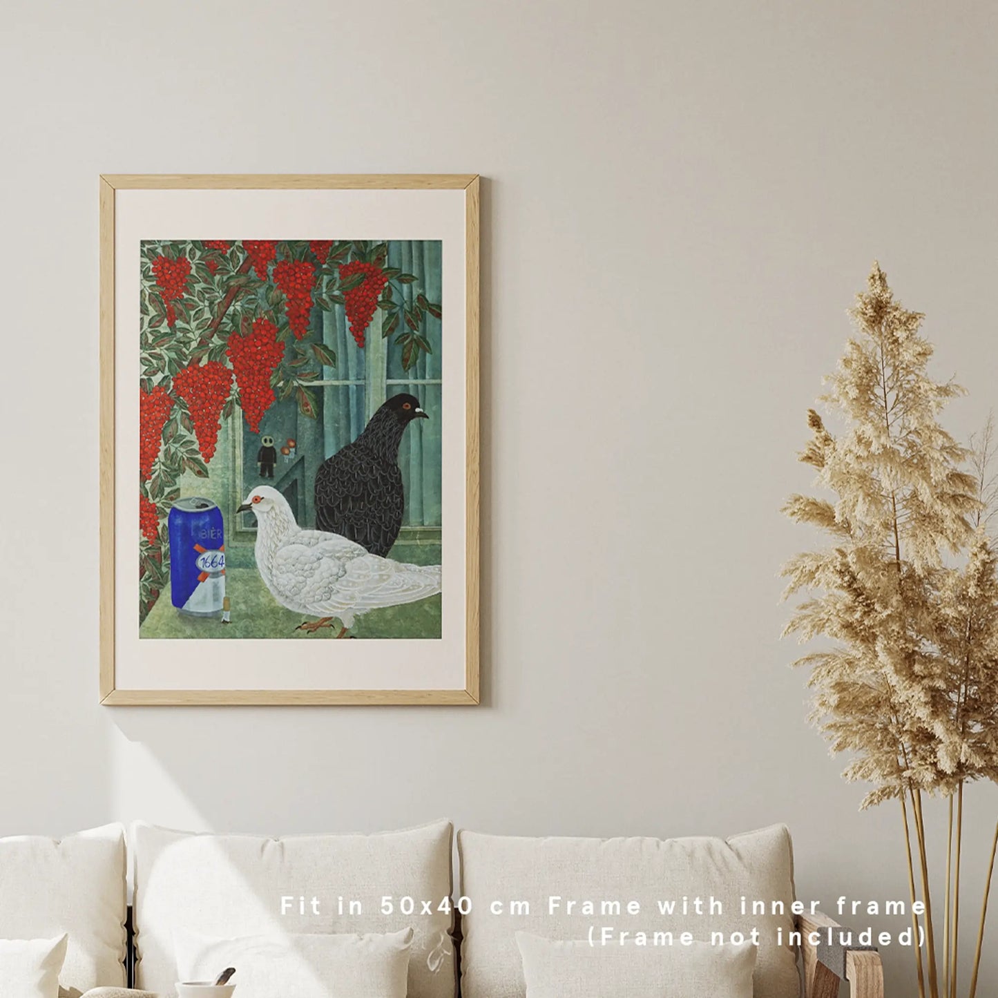 A framed 50x40 cm contemporary print of pigeons and red Nandina berries hanging on a neutral wall above a minimalist cream living room sofa.